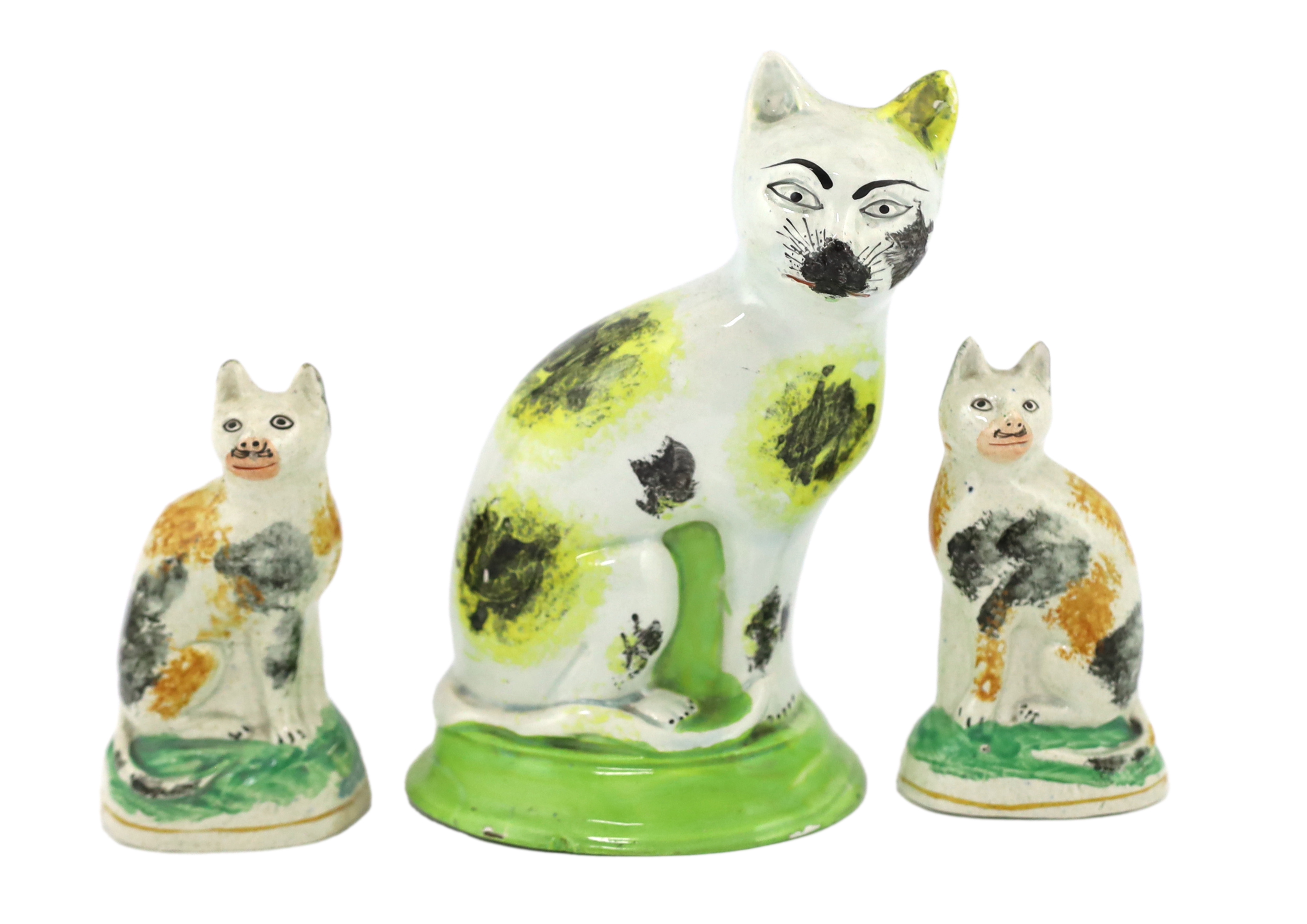 Six Staffordshire pearlware models of cats, early 19th century